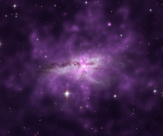 Choque de dos galaxias se esconde bajo una nube de gas