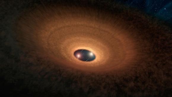 Encuentran un sistema estelar con un ´hula hoop´ cósmico