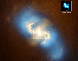 Descubren la pareja de agujeros negros supermasivos más cercana a la Tierra.