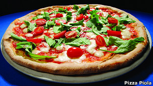 El bife argentino, amenazado por la pizza